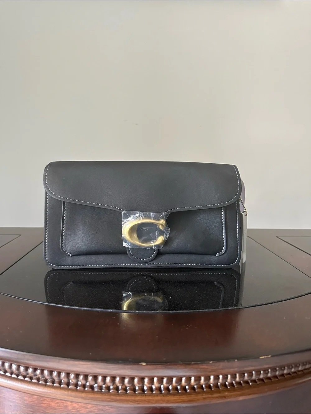 Coach Black Leather Shoulder Bag with Gold 'C' Accent